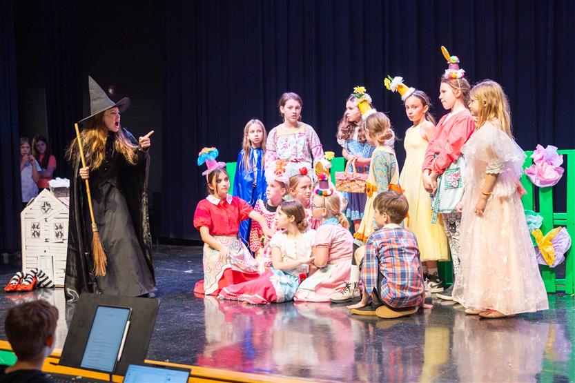 Students in a Wizard of Oz performance